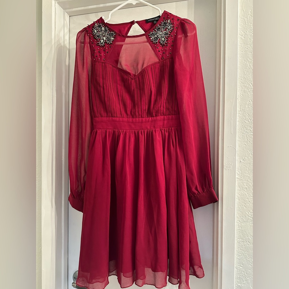 Long sleeved red knee length dress size 4